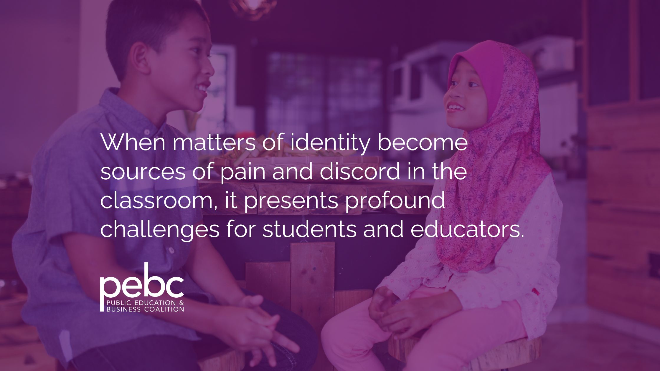Two children sit and talk in a classroom. Text reads: "When matters of identity become sources of pain, it challenges students and educators.